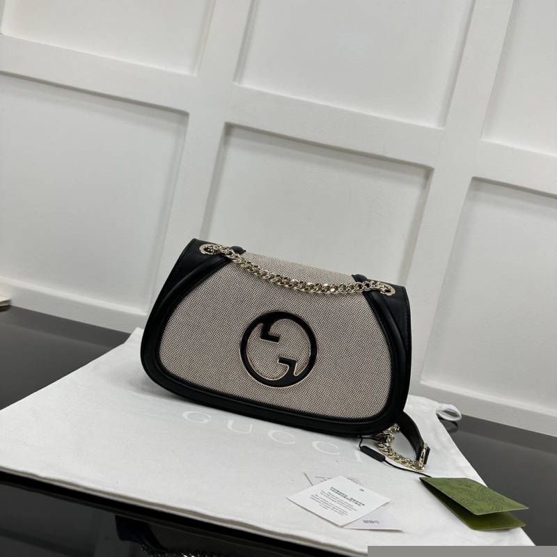 G*u*i satchel bags